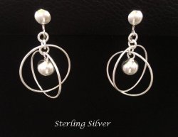 Clip On Earrings with Large Swivelling Rings in Sterling Silver